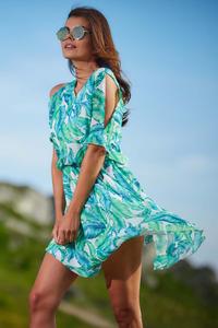 A flimsy green summer dress with flowers and slit sleeves