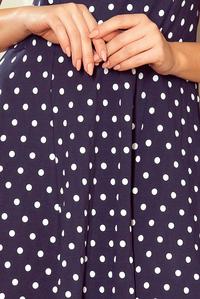 Navy blue flared dress in polka dots with neckline