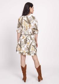 Ecru Dress fastened with the pressbuttons in tropical leaves