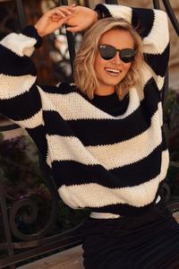 Loose sweater in wide, black and ecru stripes