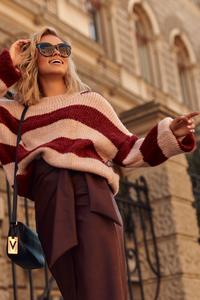 Loose sweater with wide pink and maroon stripes