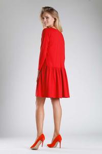 Red Dress with a Loose Fashion. Fastened with buttons